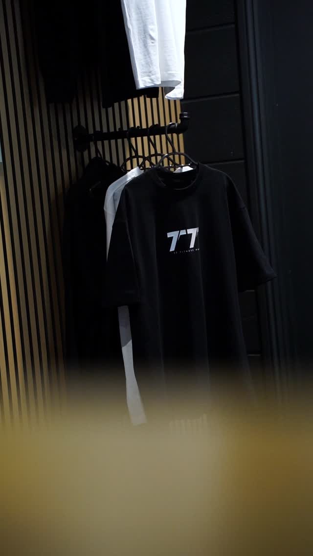 TT t-shirts on a rail