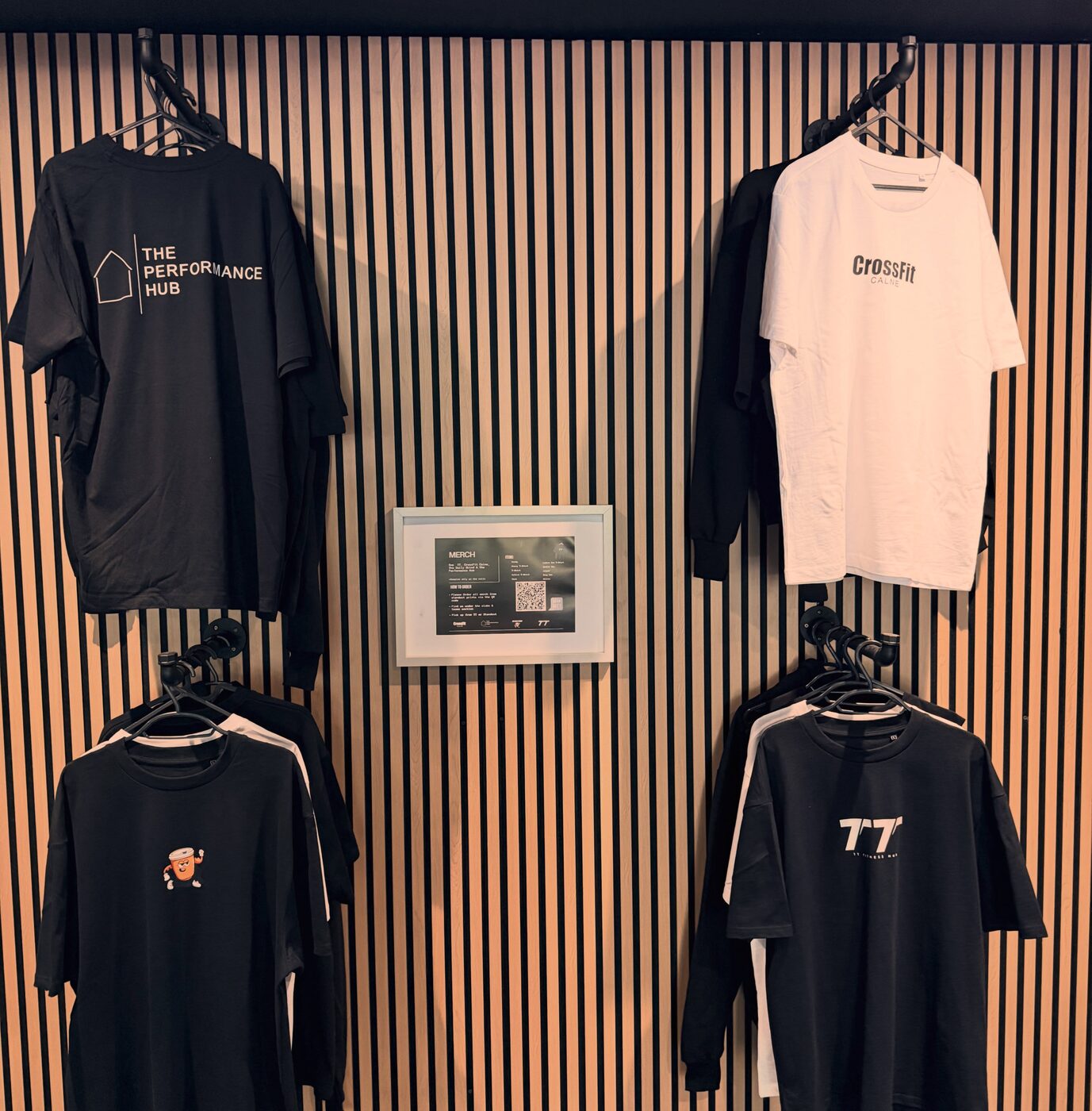 TT Fitness Hub merch wall display